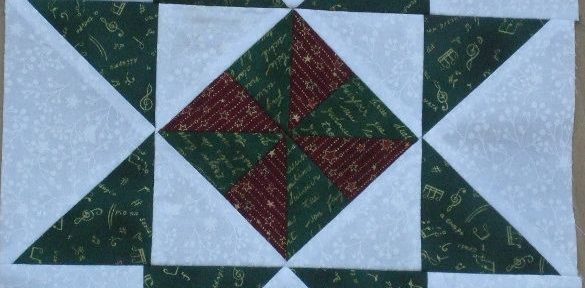 Block Nummer 1 aus der weihnachtlichen Patchworkdecke Sterntaler